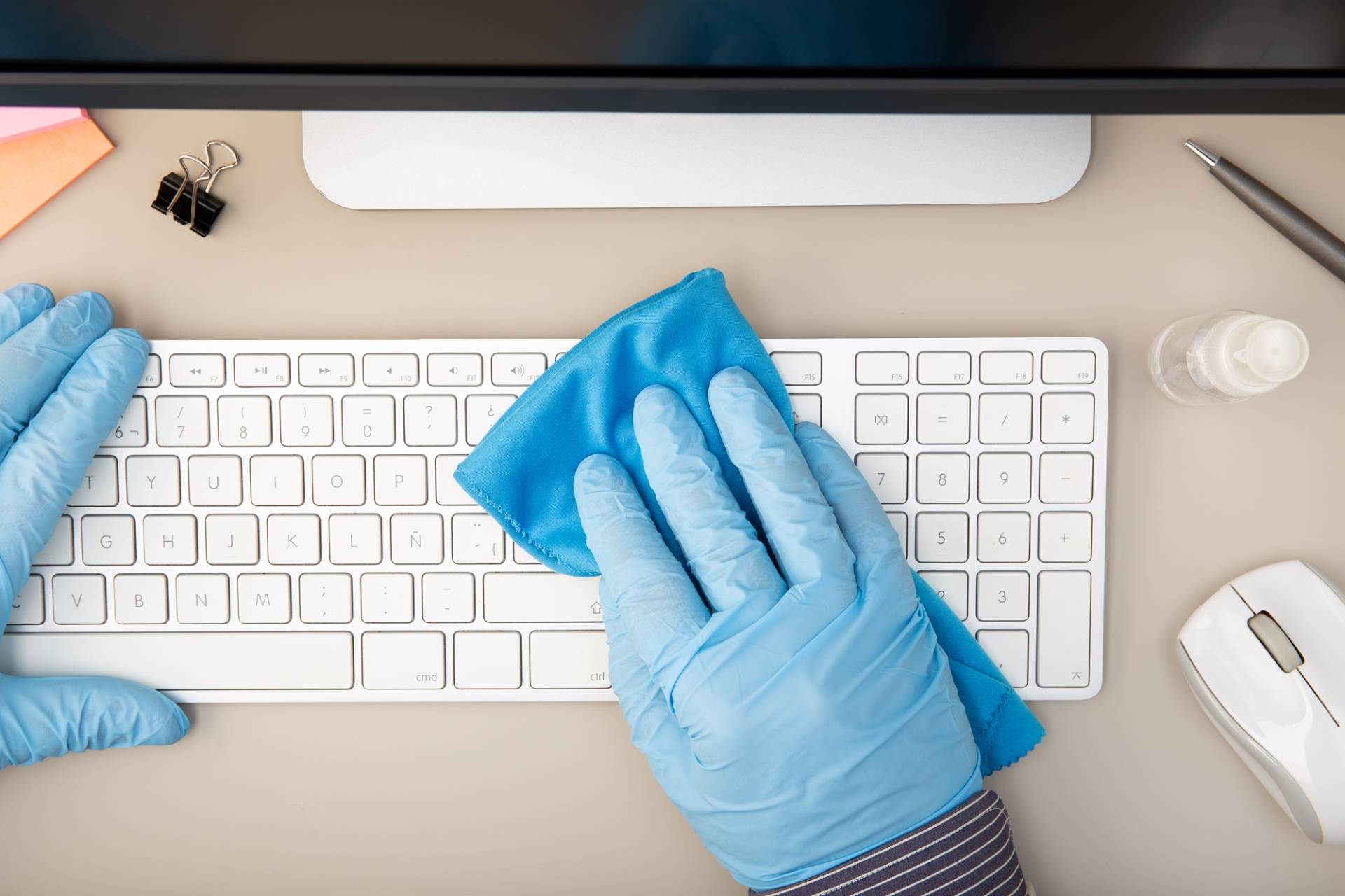 cleaning a white keyboard